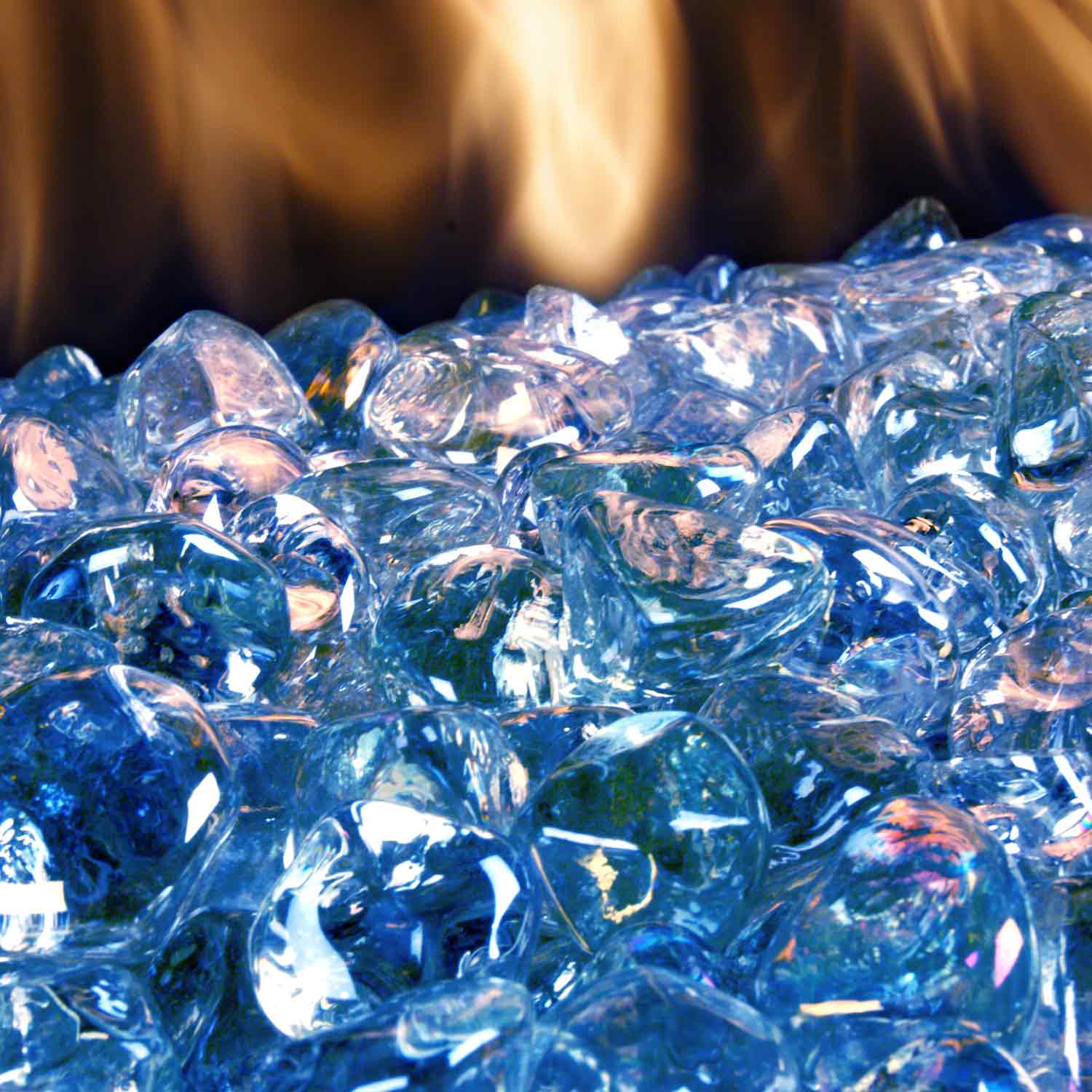 Blue diamond nuggets, glossy faceted glass rocks filling the frame