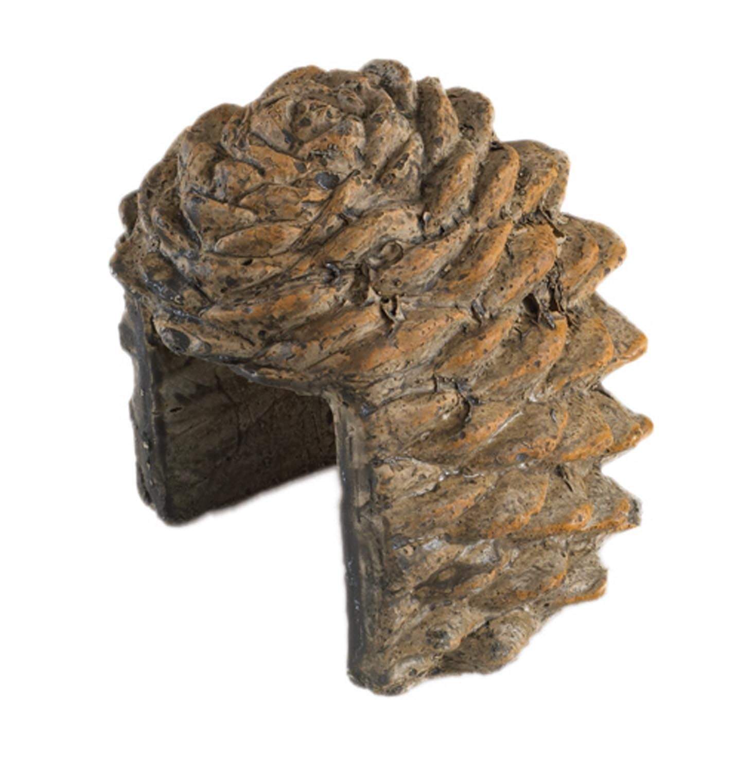 Decorative pine cone cover with textured ridges and arched opening