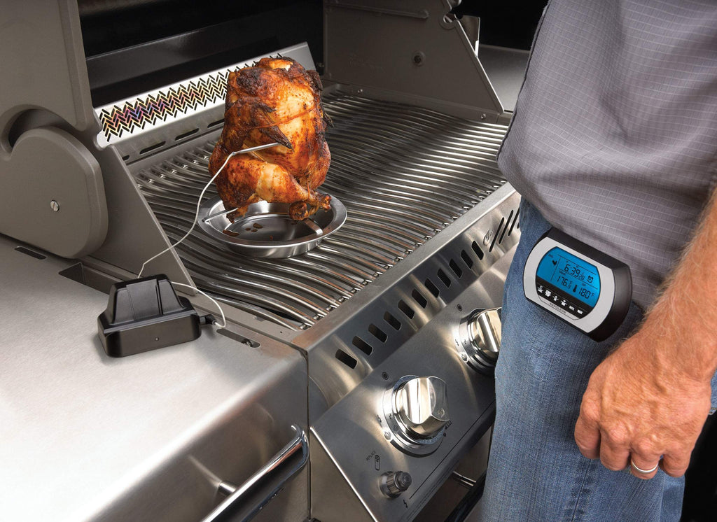 Napoleon wireless digital thermometer near grill, blue LCD reading with wire probe