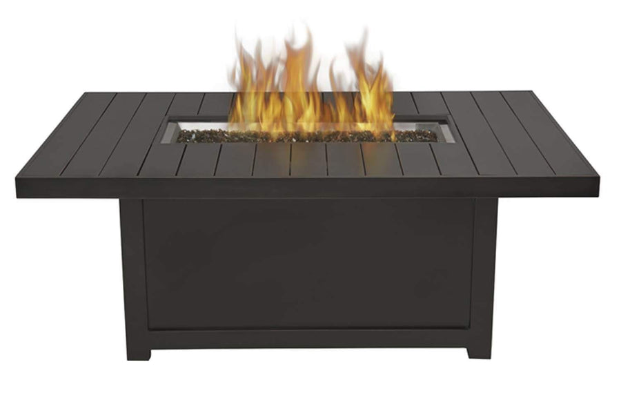 Rectangular patio fire table with dark tabletop and visible flames in center burner