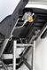 Portable propane grill underside with metal support frame and control area