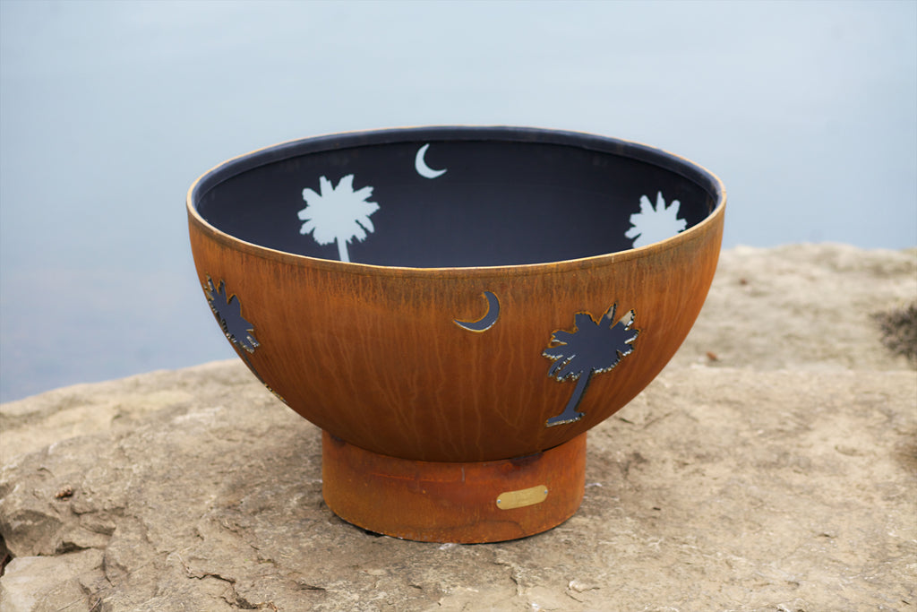 Gas fire pit bowl in bronze with moon and leaf cutout panels