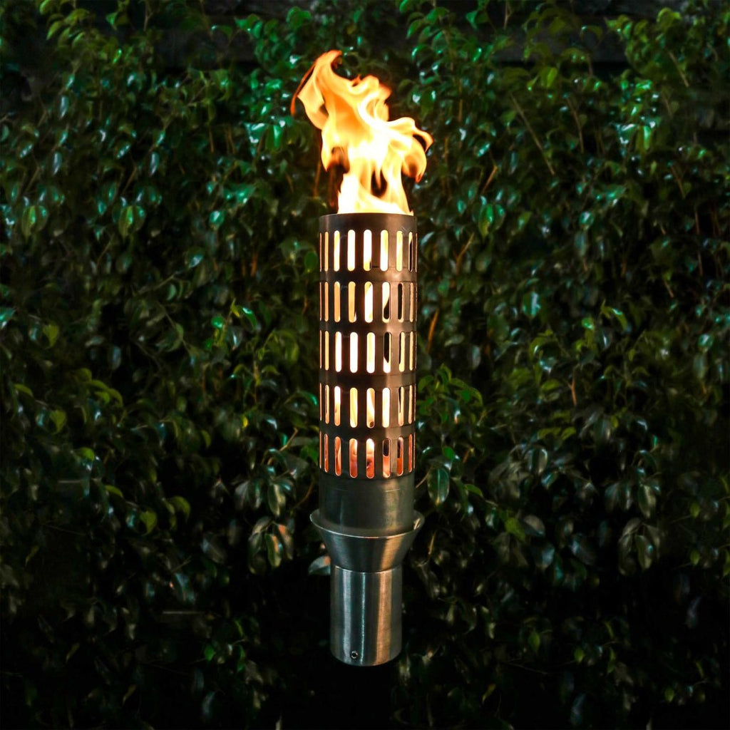 Outdoor vent toplite torch with stand, burning flame in metal cylinder