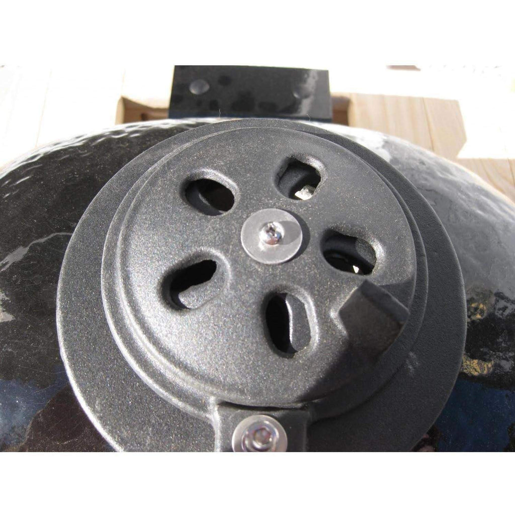 Charcoal ceramic kamado grill dome with circular air vent plate and knob