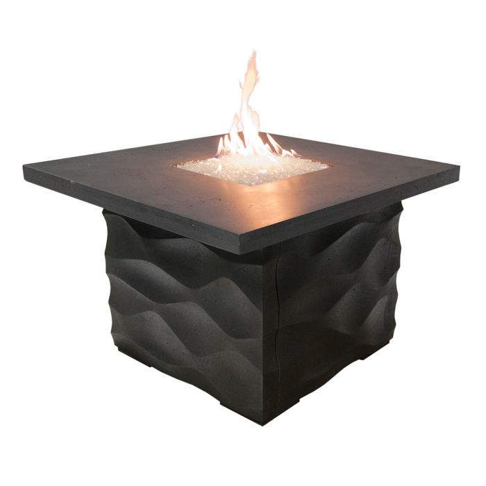Square GFRC fire table with dark base and burning flame in center