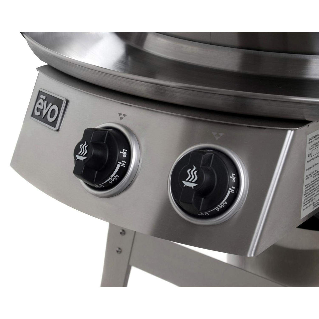 Front panel of stainless steel gas grill on cart with two temperature control knobs