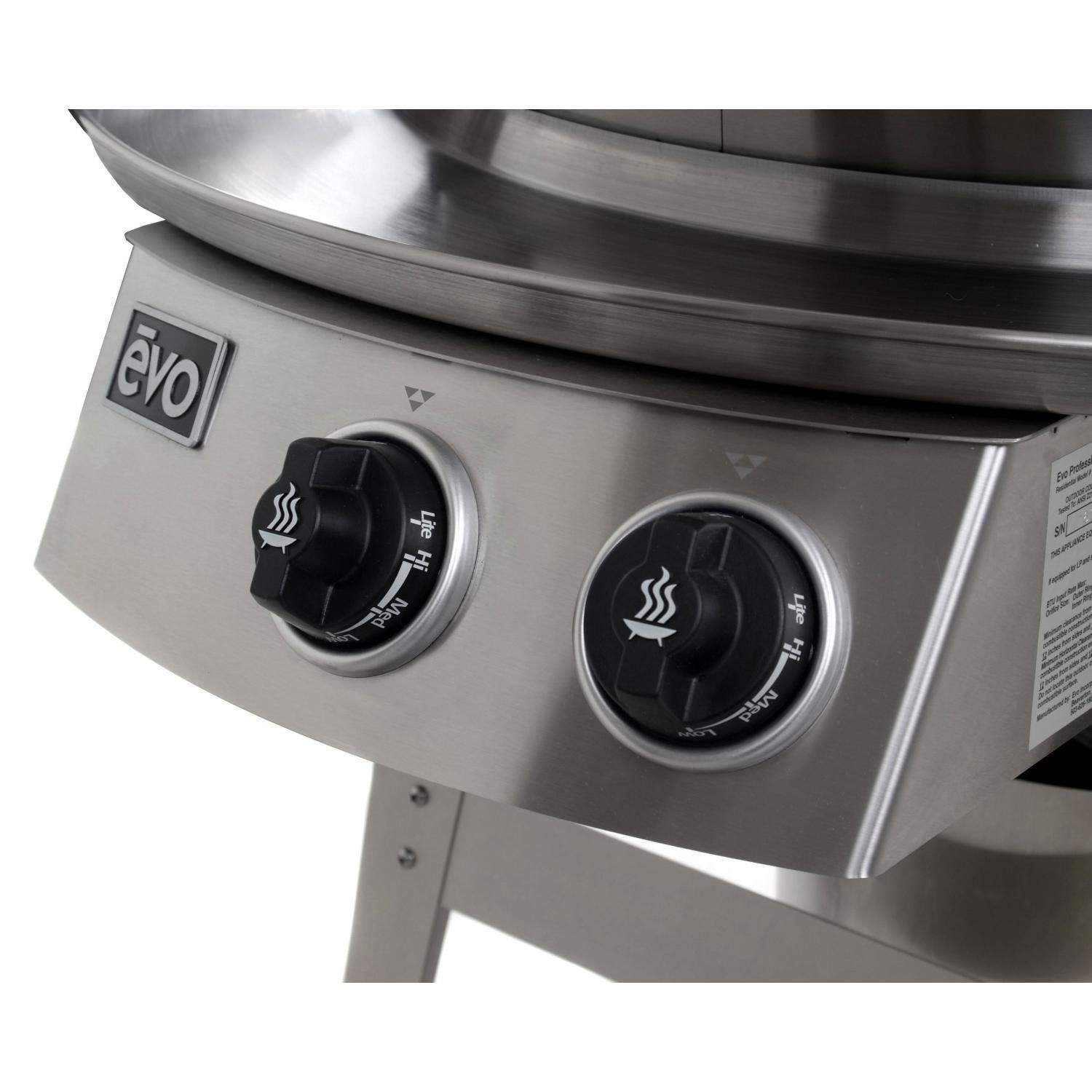 Front panel of stainless steel gas grill on cart with two temperature control knobs